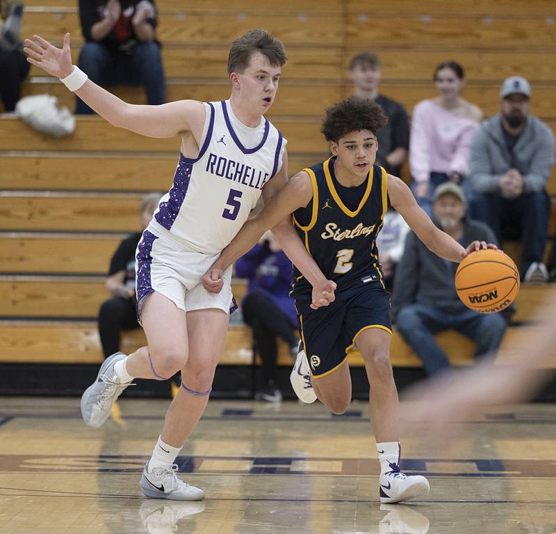 Sterling’s Deandre Maas works against Rochelle’s Mason Ludwig Saturday, Jan. 3, 2026.
