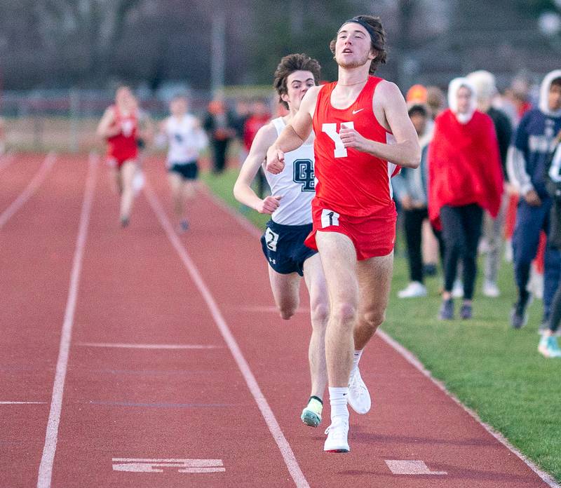 Yorkville’s Jack Stillmunkes takes first place in the 800-meter race during the Matt Wulf Invitational track and field meet at Yorkville High School on Thursday, April 14, 2022.