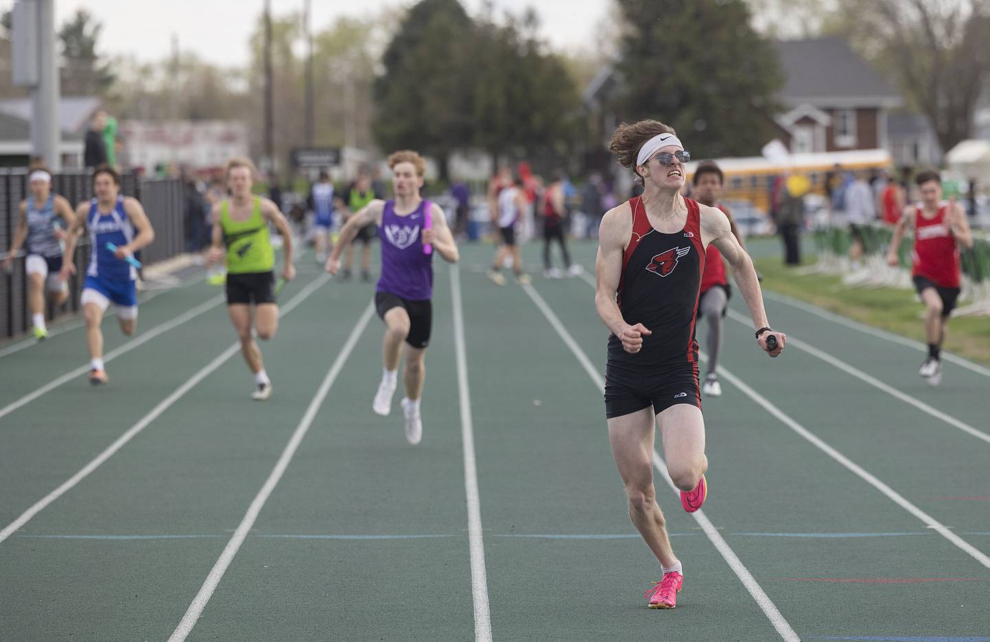 Forreston’s Michael Taylor leads the pack over the finish line in the 4x100 Friday, April 21, 2023 at the Rock Falls Rocket Invitational.