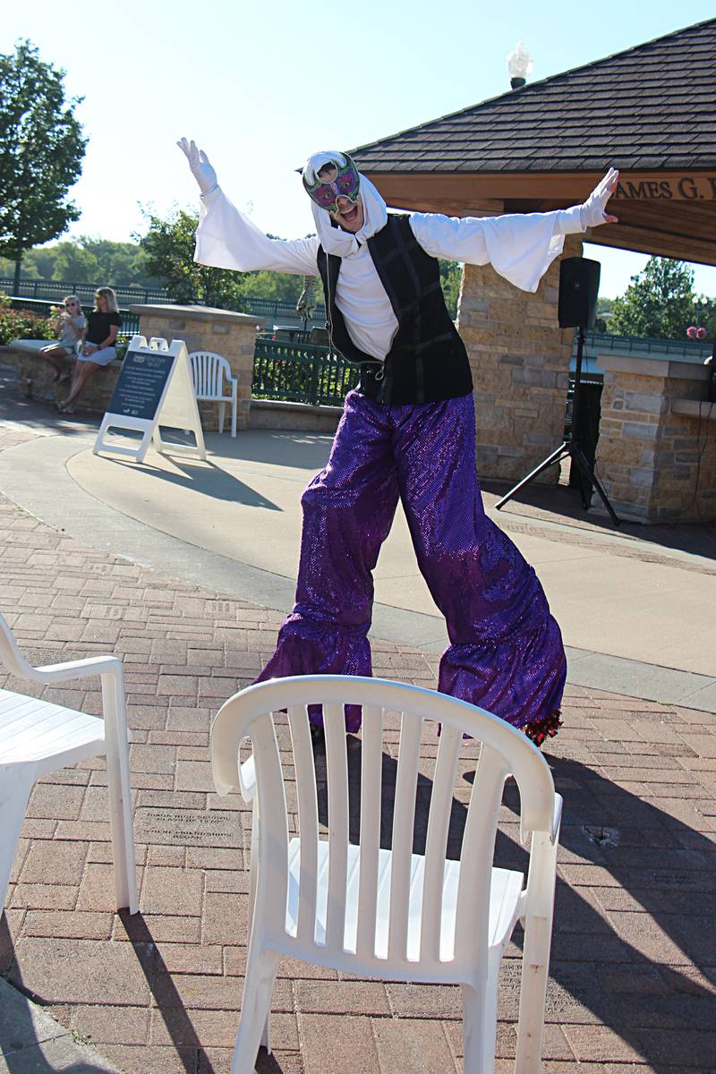 Mathew Kessler-McMunn poses for a picture while performing at Venetian Night Saturday, August 12, 2023 in Dixon.