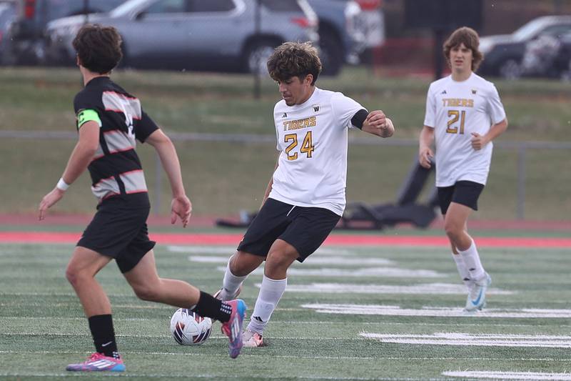 Joliet West’s Ivan Moreno passes the ball against Lincoln-Way Central in the Class 3A Lincoln-Way Central Regional semifinal on Tuesday, Oct. 22, 2024 in New Lenox.