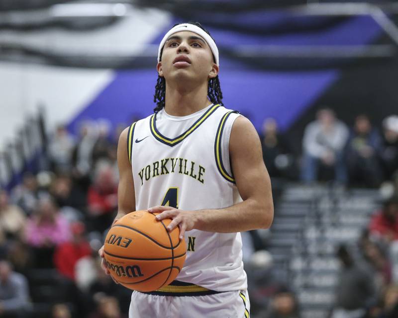 Yorkville Christian's Tray Alford (4) shoots a free throw  during their Plano Christmas Classic semi-final basketball game between Yorkville Christian at Plano Monday, Dec 29, 2025 in Plano.