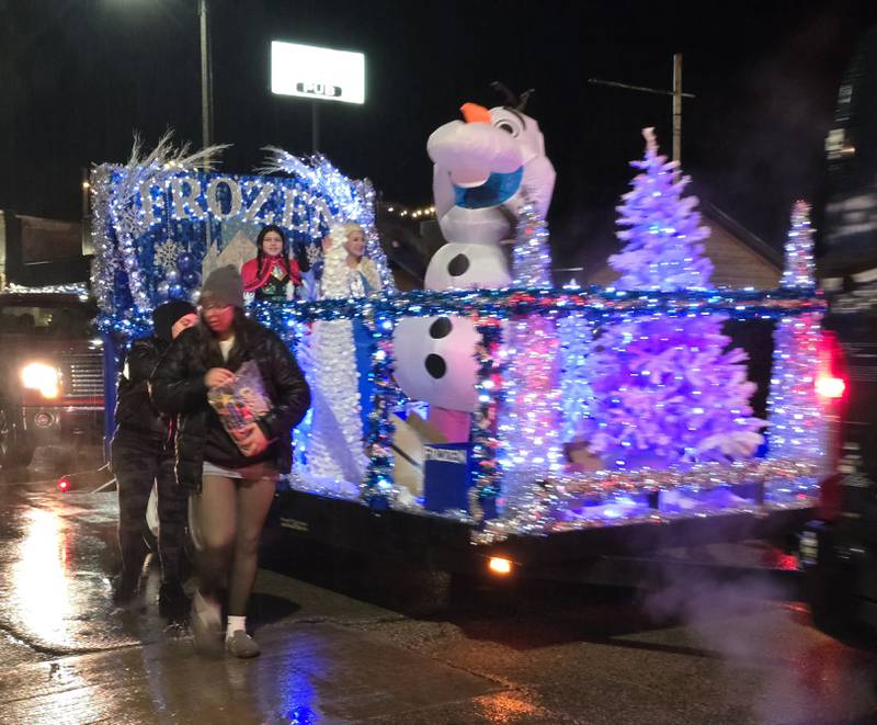 A "Frozen" themed float rides through the Winter Wonderland parade Saturday, Dec. 14, 2024, in Oglesby.