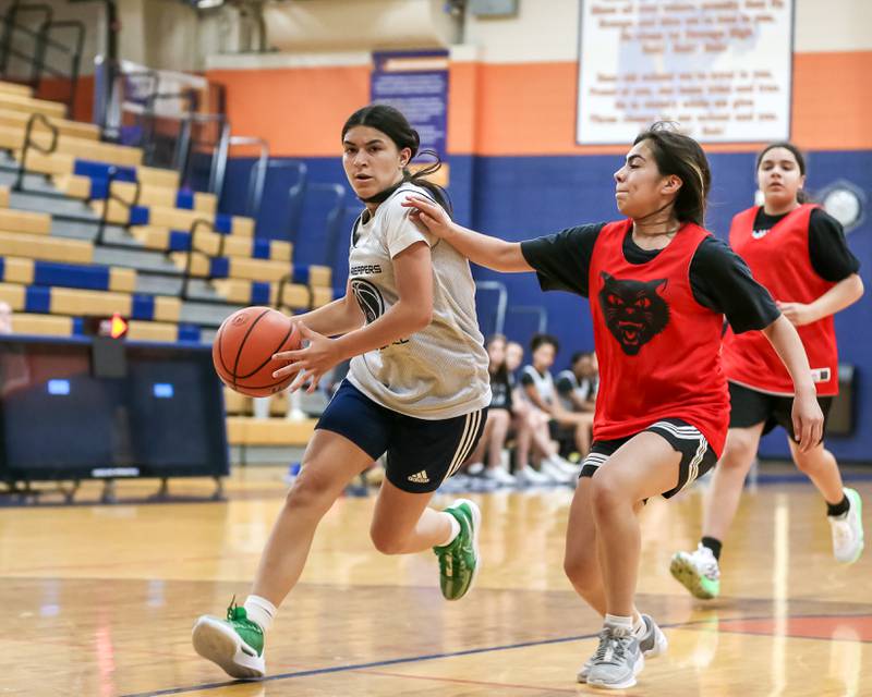 Plano's Alana Roldan drives to the basket at the Oswego girls basketball shootout tournament. June 28, 2024.