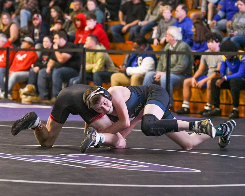 Yorkville Christian Eli Foster wrestles during the 106 weight class on Saturday Dec. 10th during the 5th place match during the Plano Reaper wrestling classic held at Plano High School.