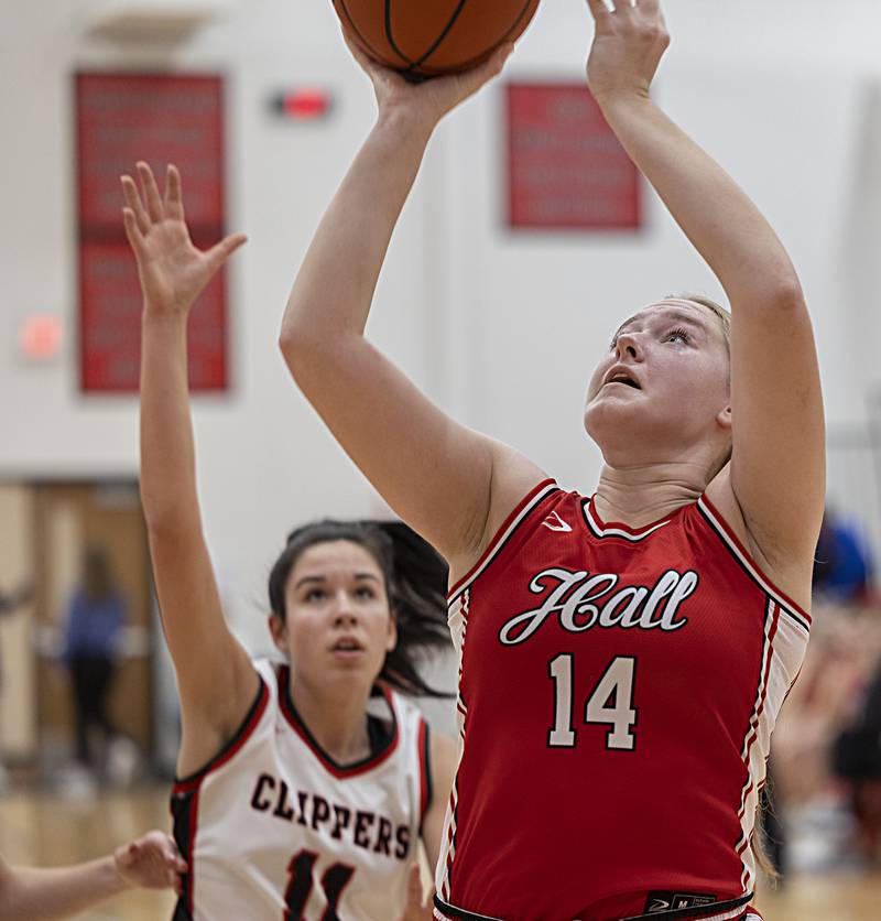 Halls’ Ella Sterling puts a shot up against Amboy Wednesday, Dec. 27, 2023 during the Amboy Holiday Basketball tournament.