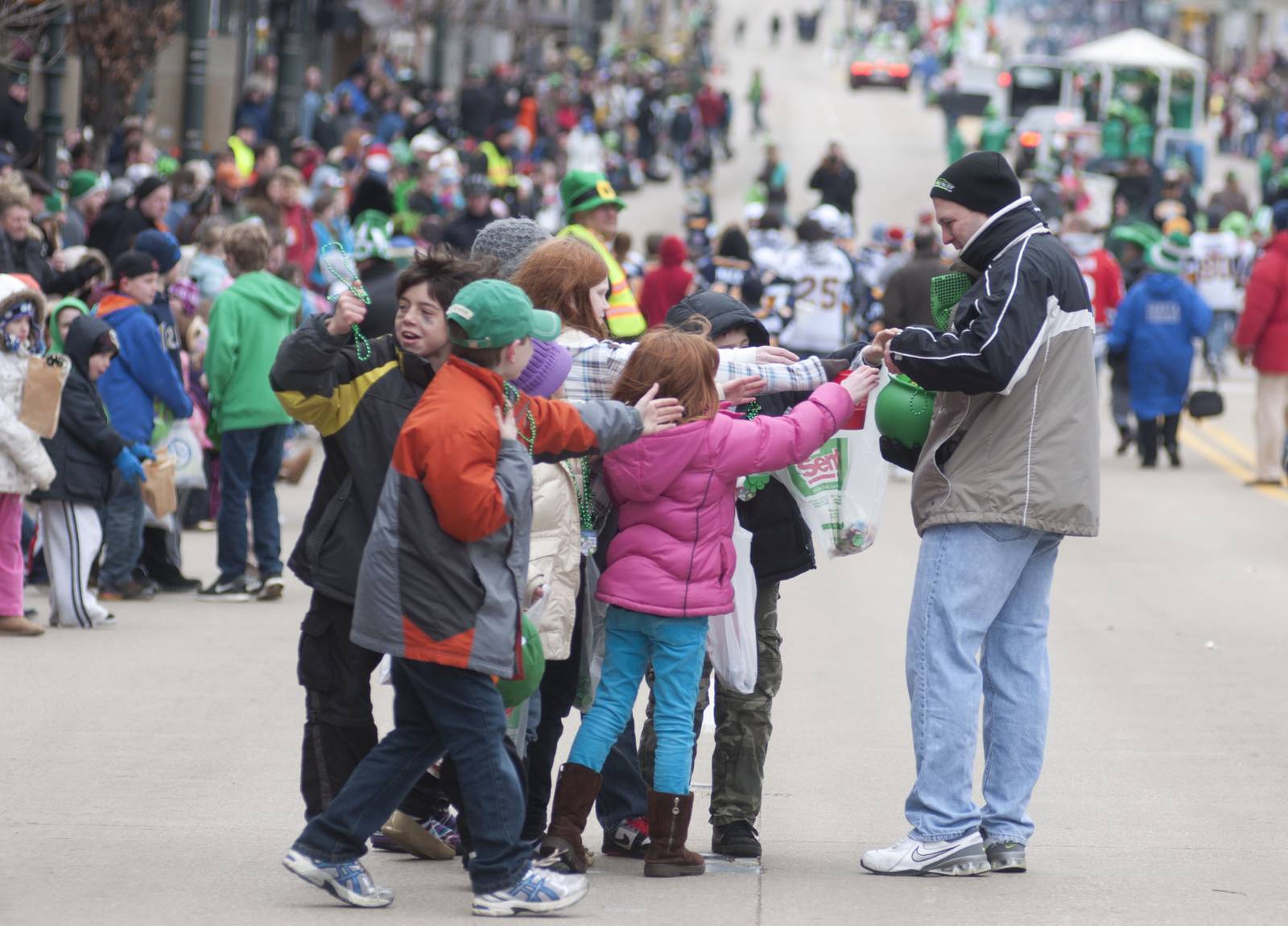 Families find ways to stay warm during St. Charles parade Shaw Local