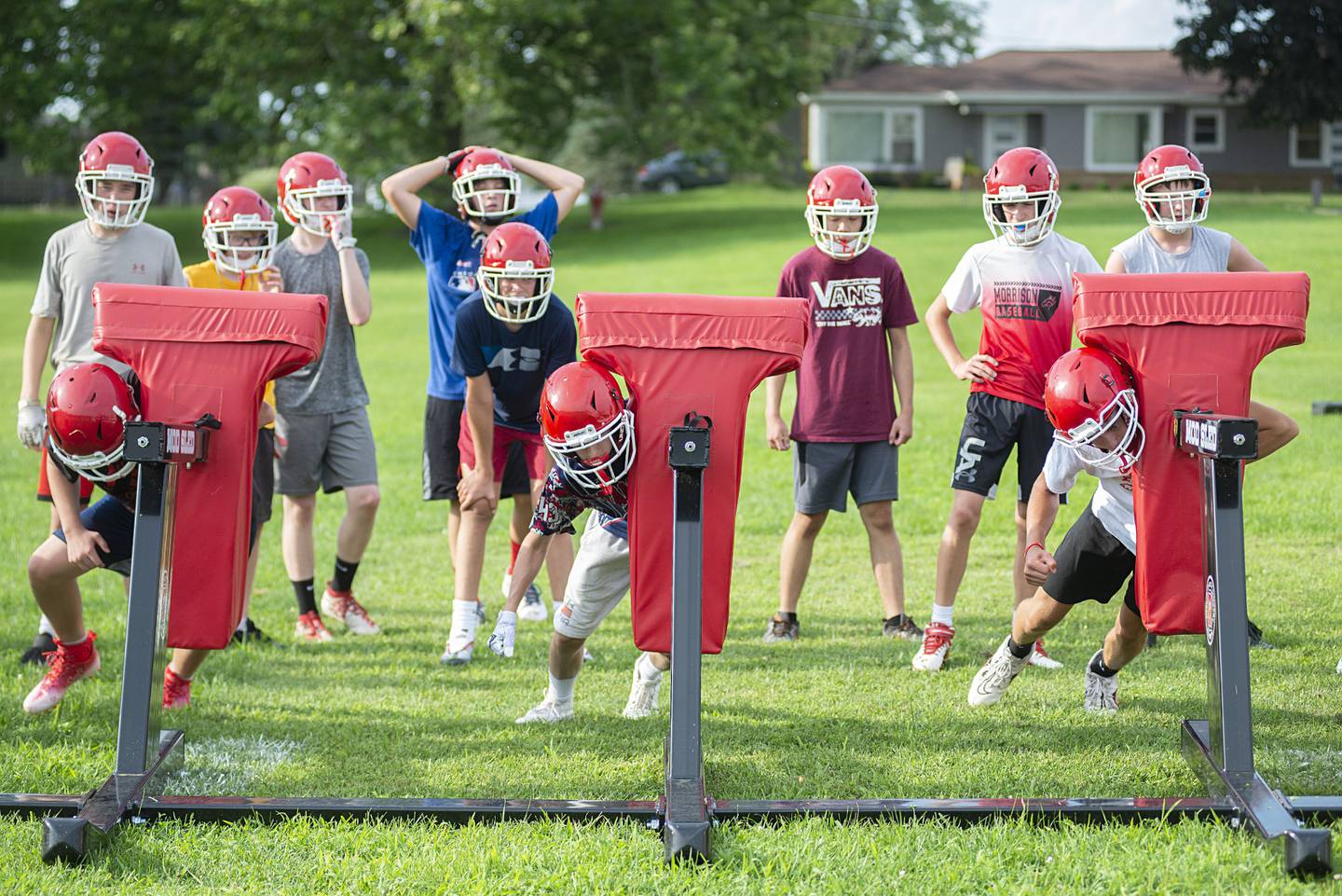 Morrison football players run through drills Tuesday, July 26, 2022. The team will open the season against Newman on August 26.
