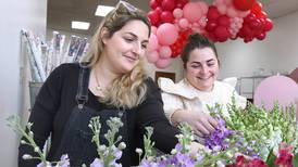DeKalb flower shop donates $7K to migrant aid nonprofit