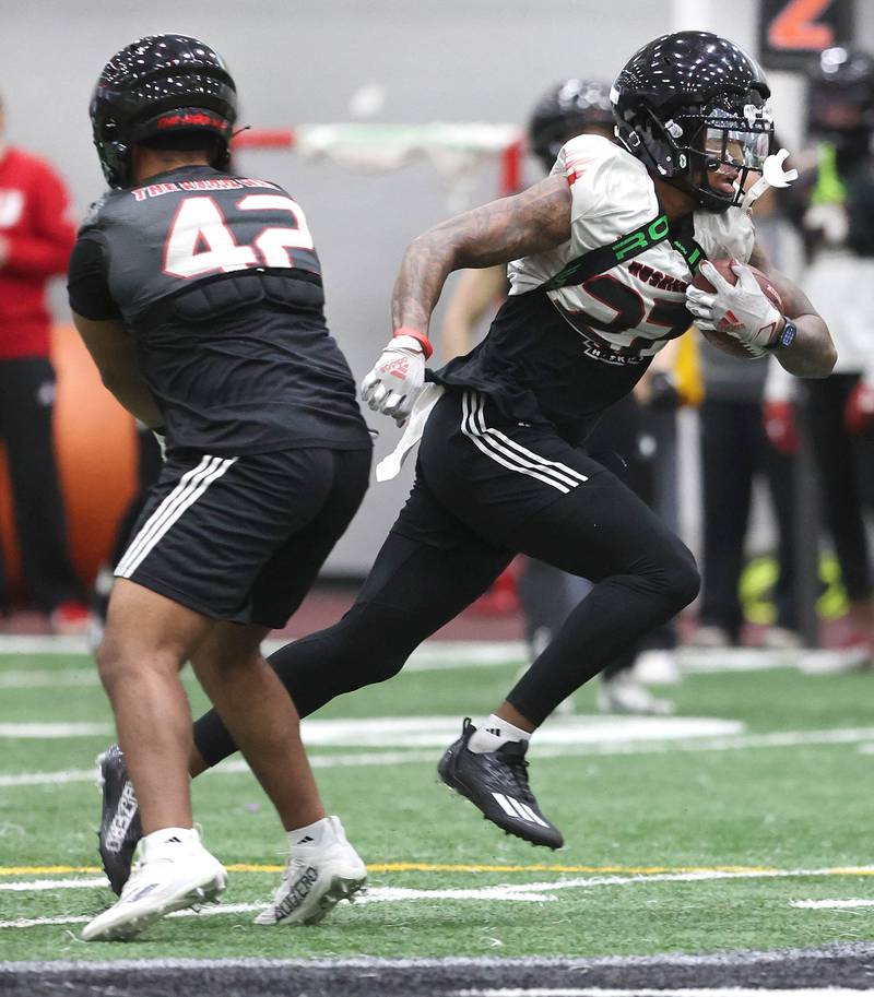 Northern Illinois University receiver Keyshaun Pipkin runs the ball after making a catch Tuesday, March 26, 2024, during spring practice in the Chessick Practice Center at NIU.