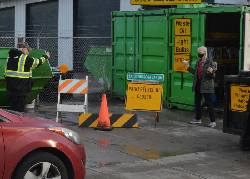 Nunda Township Road District recycling center manager Ron Salm helps a resident recycle items on Monday, Dec. 27, 2021. The road district's Highway Commissioner Mike Lesperance won a court ruling last week in a lawsuit he filed against the Nunda Township Board of Trustees over changes the board made to a more than $3 million tax levy he proposed.