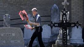 Photos: Flags are placed at the gravesites of veterans in Johnsburg 