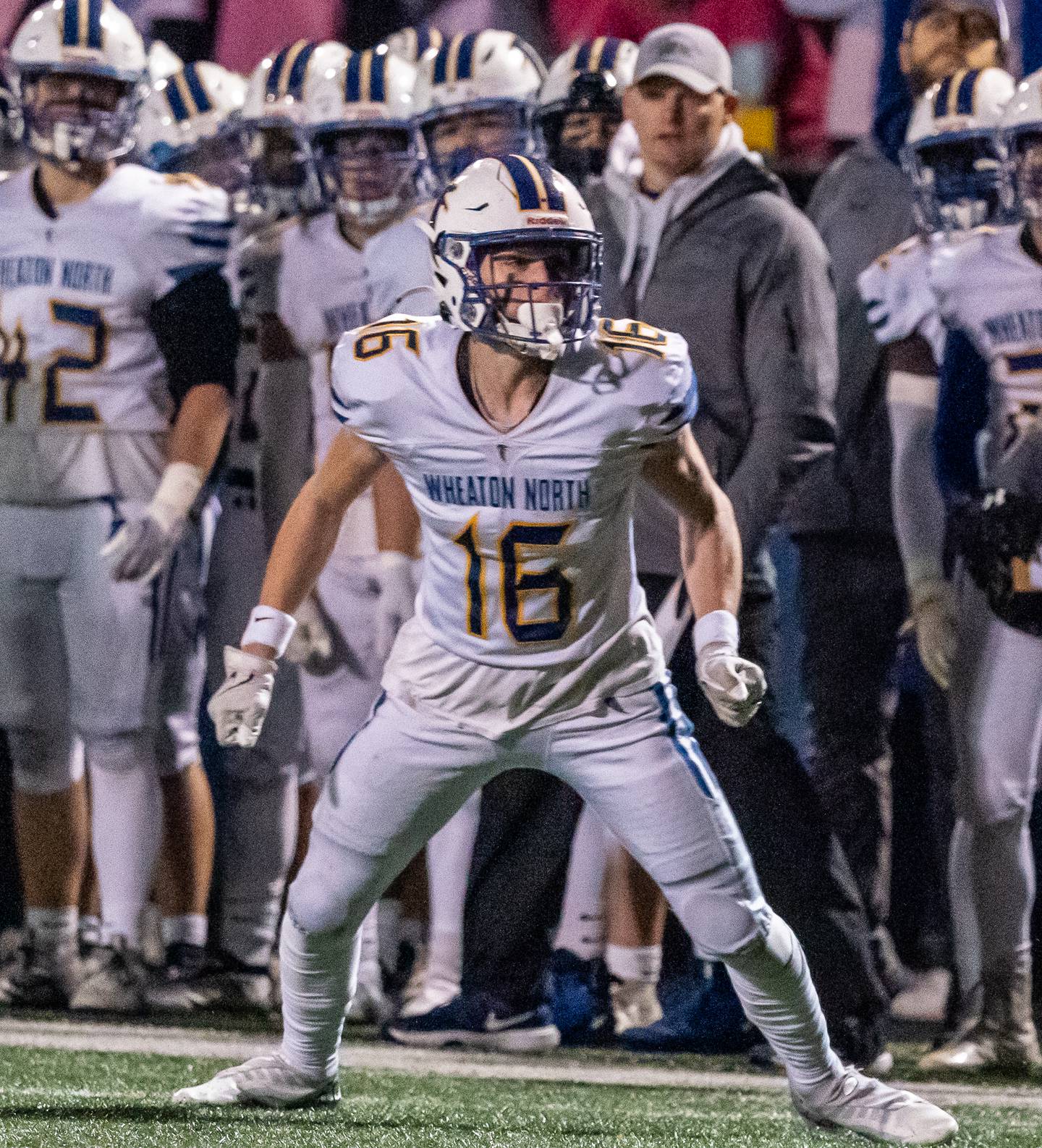 Wheaton North’s Matt Kuczaj (16) drops back in coverage during a football game against Geneva at Geneva High School on Friday, Oct 14, 2022.