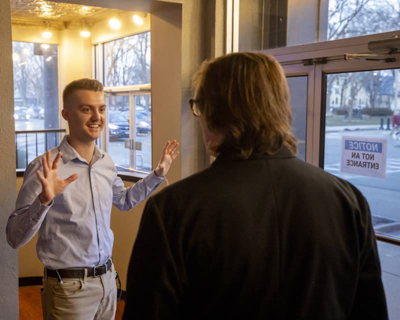Film Director Kyle Peterson discusses Ice Climbers of Starved Rock with climber Bruce Turner prior to the first showing of the premier at Roxy Theater on February 3, 2024.