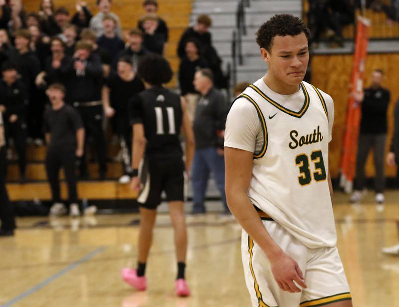 Crystal Lake South's Cooper Buelna walks off the court after Crystal Lake South lost to Kaneland in the IHSA Class 3A Rochelle Sectional championship basketball game on Friday, March 7, 2025, at Rochelle High School.