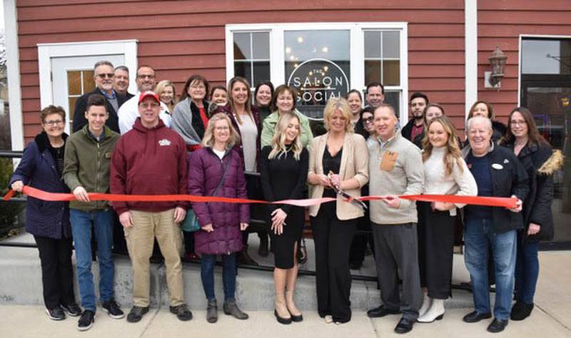 Members of the Yorkville Area Chamber of Commerce recently gathered to hold a ribbon cutting for The Salon Social, at 223 S. Bridge Street in the heart of downtown Yorkville. The newly opened salon specializes in blonding, color trends, and handtied extensions. Learn more at salonsocialyorkville.com. (Photo provided)