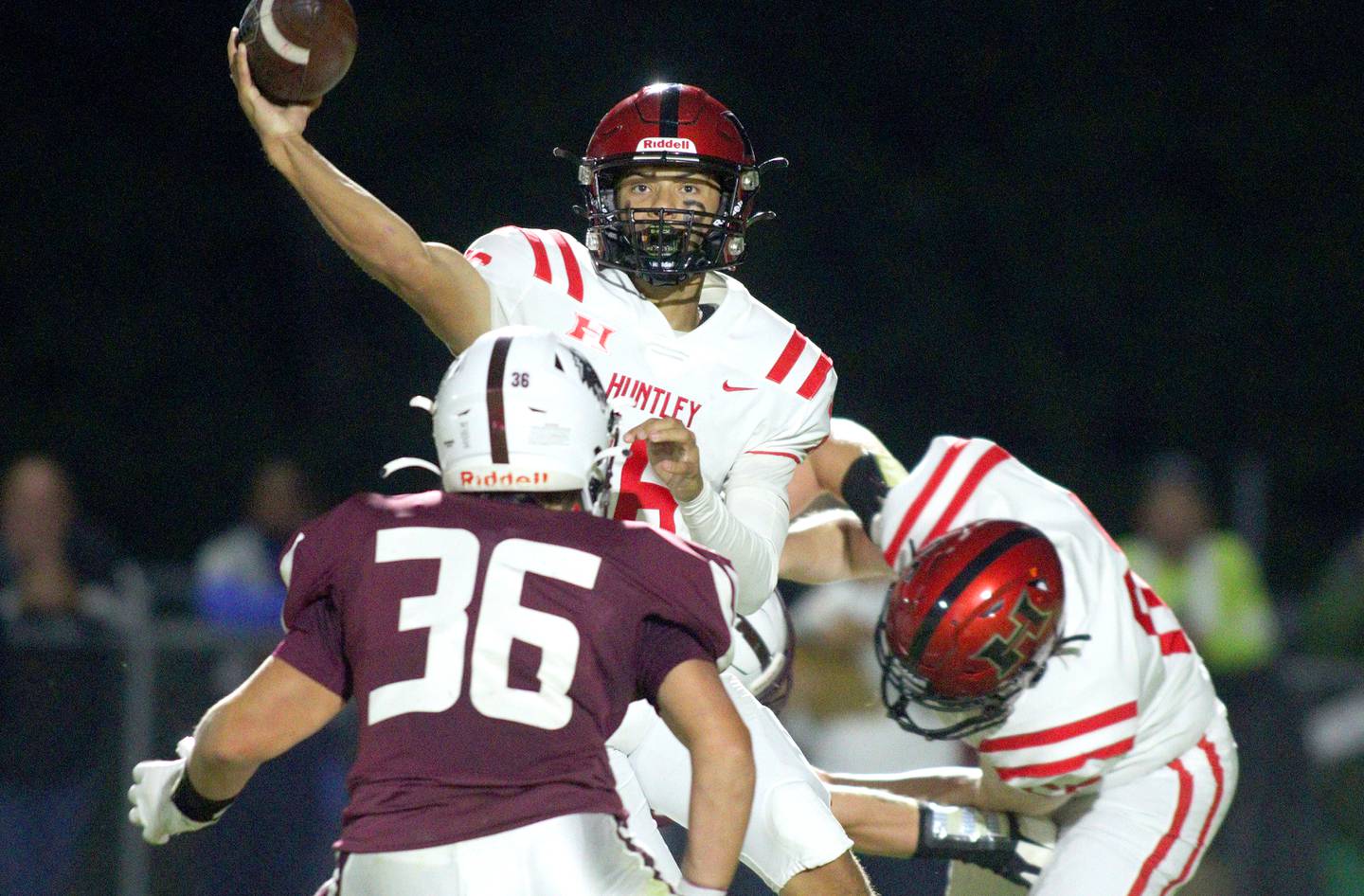 Huntley’s Braylon Bower passes against Prairie Ridge in varsity football at Crystal Lake Friday night.