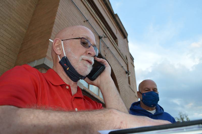 Scott Drabant, a longtime resident and public servant for Richmond, speaks on the phone to the Richmond Village Board of Trustees on Tuesday, April 27, 2021, to protest the sale of Richmond's Memorial Hall, which was approved by a 6-0 vote of the board with one member absent.