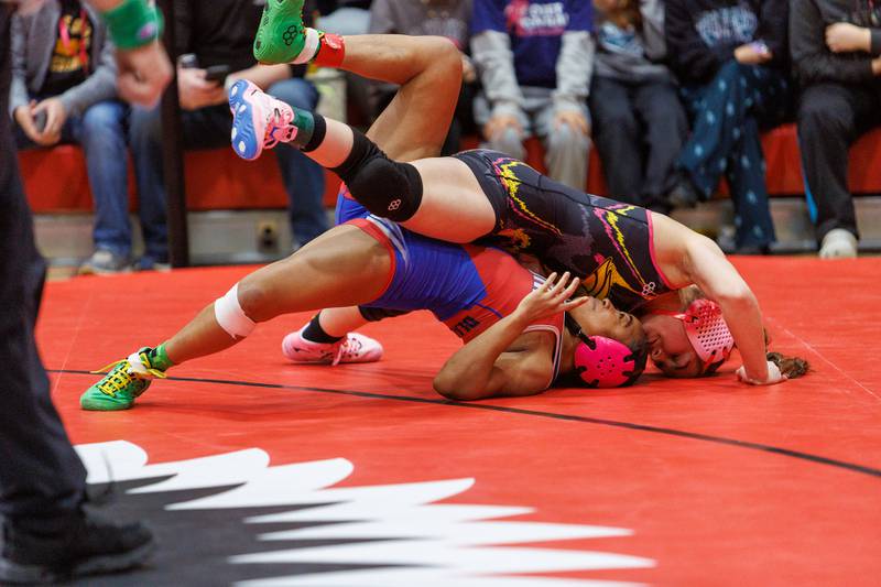 Metea Valley's Ashley Basmajian and West Aurora's Aiyanah Sylvester compete in the championship 120 lb class at the East Aurora Wrestling Regional on Saturday, Feb.7,2026 in Aurora.