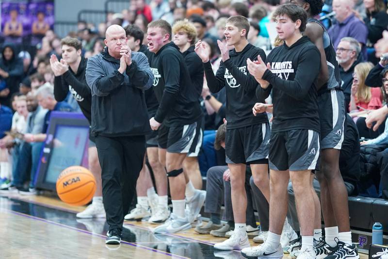 Kaneland's bench cheers after a call against Yorkville Christian during a championship final basketball game in the 61st annual Plano Christmas Classic at Plano High School on Saturday, January 1, 2017.