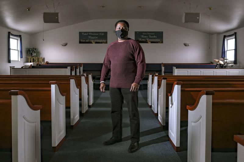 Pastor Tracy Jennings poses for a photo on Wednesday, Jan. 13, 2021, at Total Christian Life Ministry in Joliet, Ill. Pastor Jennings is working to convince local officials to lessen truck traffic on the residential roads near his church.