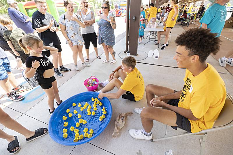 Paisley Feldthouse, 7, of Rock Falls pleads her case for a prize being that it’s her birthday Friday, August 4, 2023 in Sterling. BLIND leaders Owen Farral (left) of Prophetstown and Isaiah Williams of Newman gladly relented and let the birthday girl pick a prize.