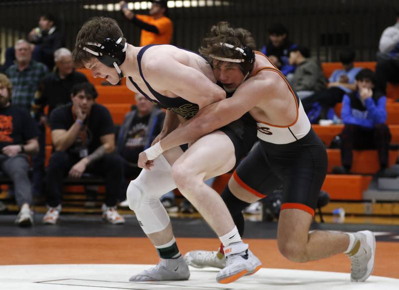 Crystal Lake Central’s Cayden Parks tried to control Wauconda’s Mike Merevick as they compete in the 190-pound championship  match in the IHSA 2A Crystal Lake Central Wrestling Sectional on Saturday, Feb. 15, 2025, at Crystal Lake Central High School.