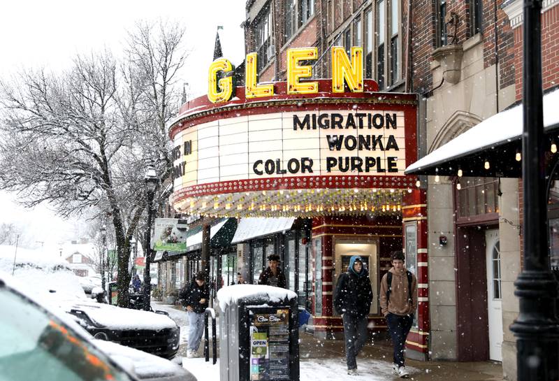 Snow falls in downtown Glen Ellyn on Tuesday, Jan. 9, 2024.