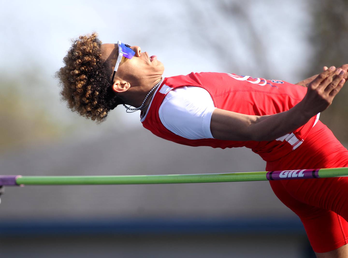 South Elgin’s Jalen Jones clears the bar in the high jump competition during the Kane County Boys Track and Field Invitational at Geneva High School on Monday, May 9, 2022.