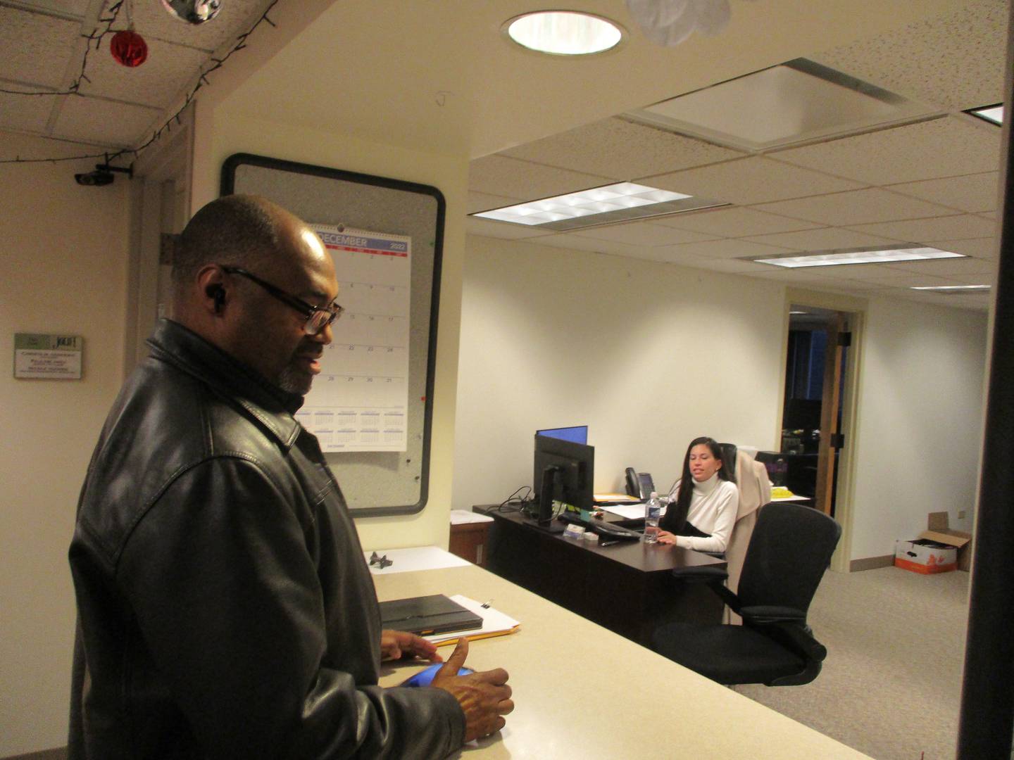 Joliet Council Member Terry Morris waits at the window of the city clerk's office on Monday to file his petitions to run for reelection in the April 4 election. Dec. 19, 2022.