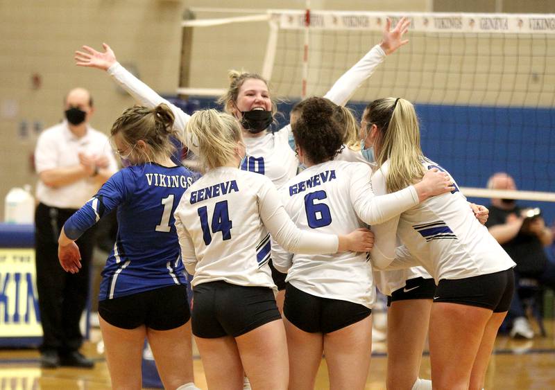 Geneva's Devynn Day (center) celebrates a win with her team over Wheaton Warrenville South at home on Wednesday, April 21, 2021.