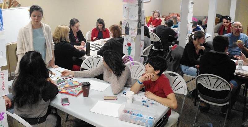 (Left to right); Artist Danielle Casali leading a brainstorming workshop with the Fox Valley Jewish Neighbors organization