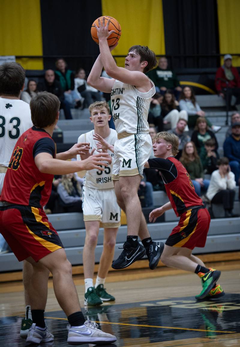 Bishop McNamara's Teddy Fogel elevates for a shot in a game against St. Anne on Wednesday, November 26, 2025.