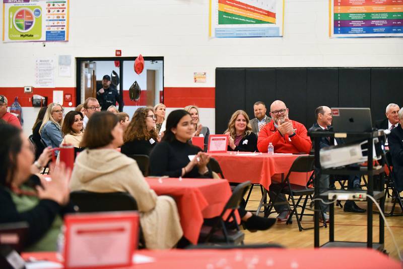 Attendees applaud for the Bradley Central student council members speaking on the student panel Tuesday at a community stakeholder event at Bradley West Elementary.
