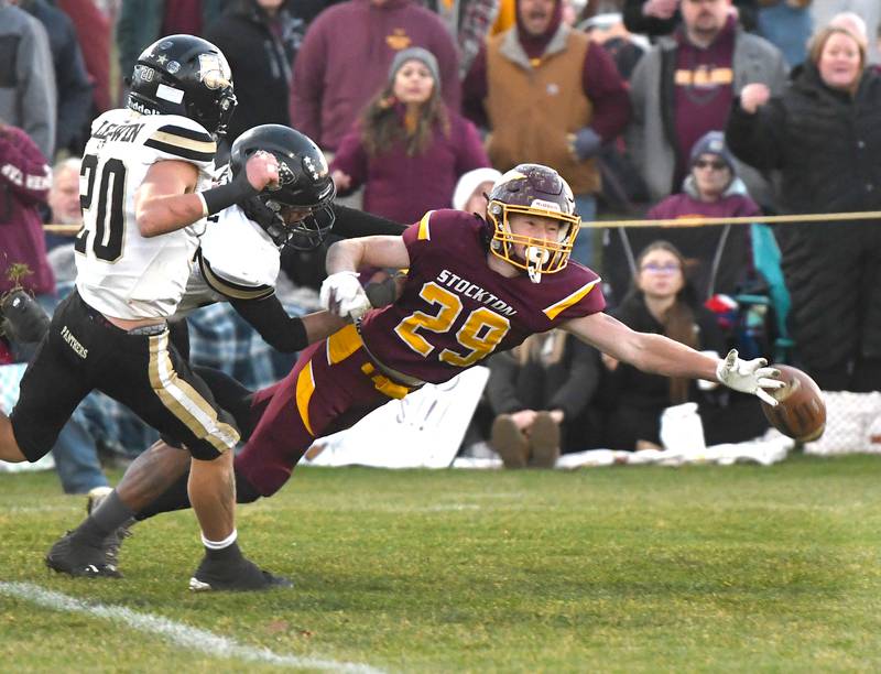 Stockton's Morgan Haas dives for a pass in 1A semifinal action against Lena-Winslow on Saturday, Nov. 22, 2025 in Stockton.