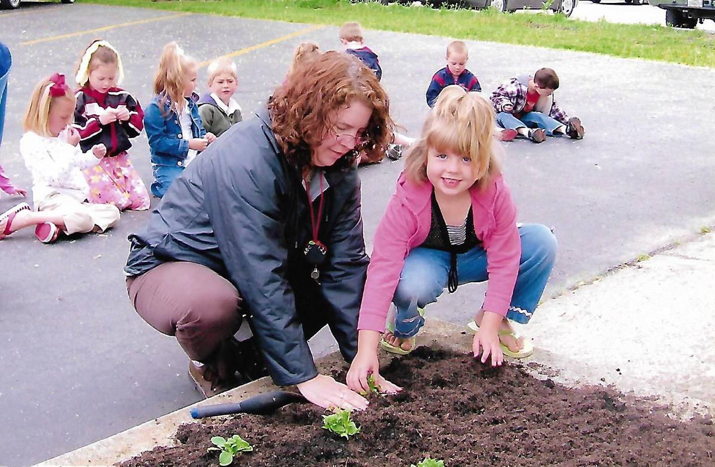 A 2008 Holy Trinity Lutheran Preschool class takes part in an outdoor activity.