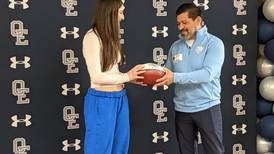 Chicago Bears present Oswego East’s flag football quarterback with community award