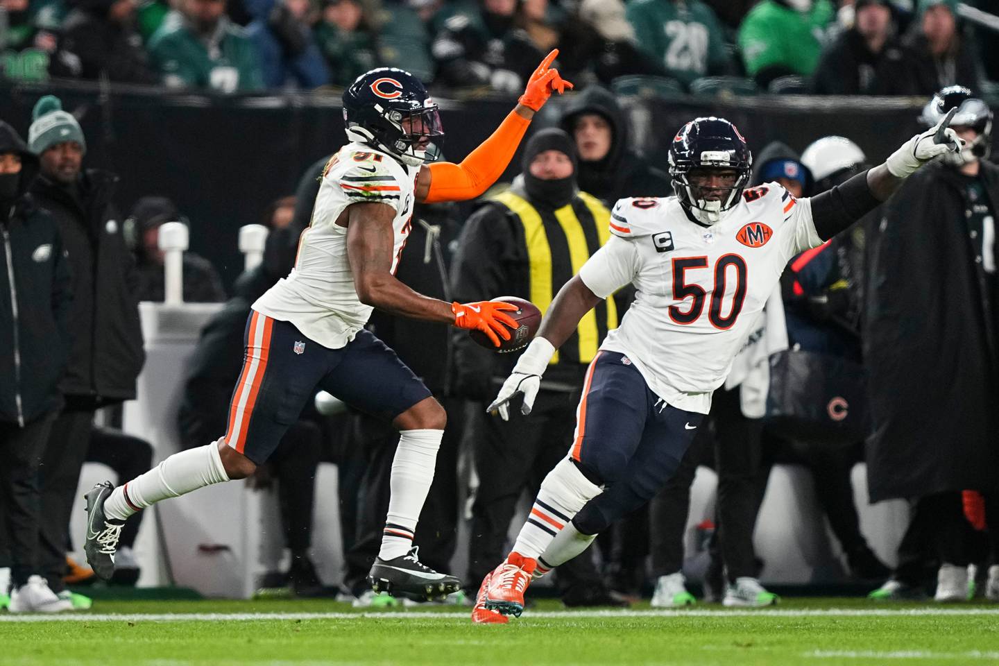 Chicago Bears safety Kevin Byard III (31), left, celebrates his interception during the second half of an NFL football game against the Philadelphia Eagles, Friday, Nov. 28, 2025, in Philadelphia. (AP Photo/Matt Rourke)