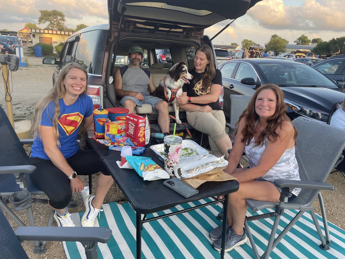 Accompanying Australian Shepherd Ripley to the McHenry Outdoor Theater to see "Superman" July 26 were (from left) Amber Cook, Wayne Viehweg, Jheri Emmerling and Silke Cook, all of the Wadsworth area.