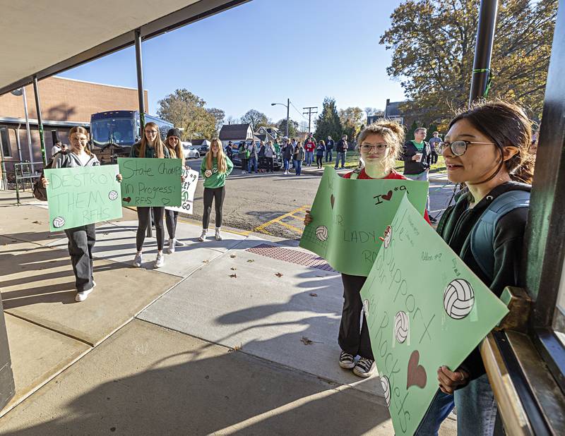 Rock Falls High School students celebrate the volleyball team as it leaves for the state tournament Thursday, Nov. 9, 2023.