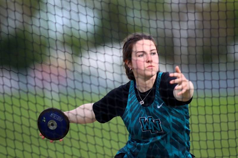 Woodstock North’s Brenna McConnell competes in the discus during KRC Conference Track Meet action at Marengo High School in Marengo on Tuesday, May 6, 2025.
