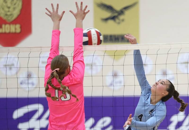 Parkview Christian's Tehya Knap has her spike blocked by Earlville's Audrey Scherer during the Class 1A Regional semifinal game on Monday, Oct. 28, 2024 at Serena High School.