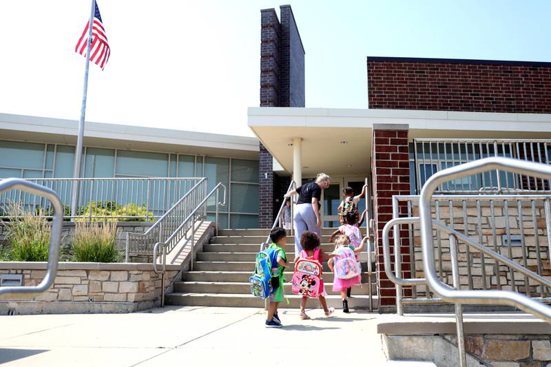 Students arrive for the first day of school for the Geneva Early Learning Program on Monday, Aug. 21, 2023.