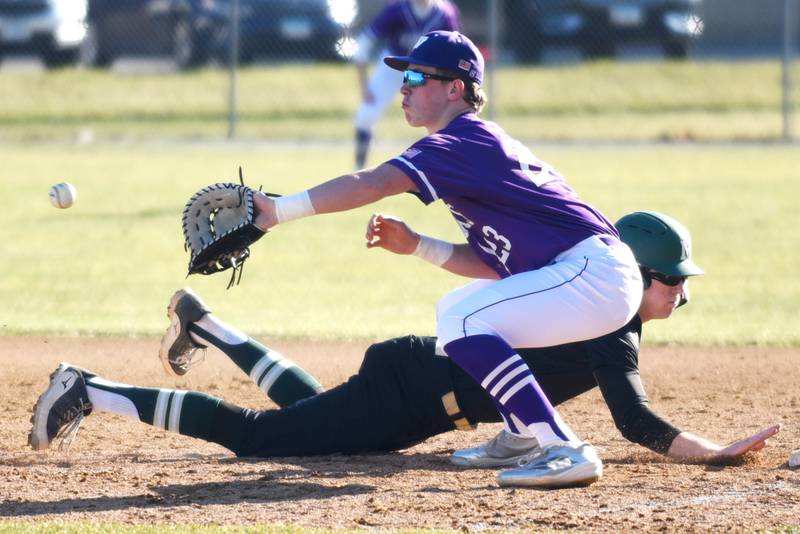 Wilmington's Cooper Holman, facing left, fields a pickoff throw as Bishop McNamara's Callaghan O'Connor dives back during a game at McNamara Monday, March 17, 2025.