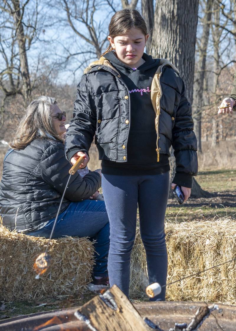 Roasting marshmallows and making s'mores was just one of the activities at Polarpalooza hosted by the DeKalb Park District at Hopkins Park in DeKalb on Saturday, Feb. 3. 2024.