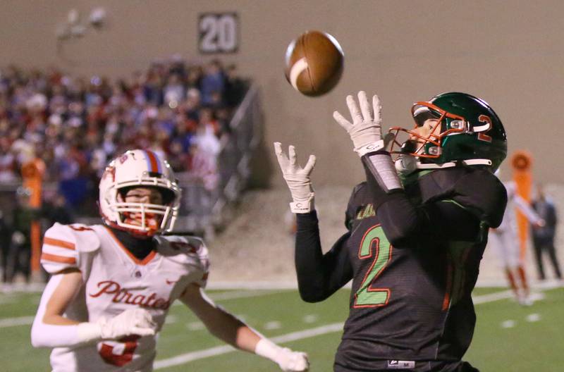 L-P's Seth Adams makes a catch over Ottawa's Hayden Swett on Friday, Oct. 6, 2023 at Howard Fellows Stadium.