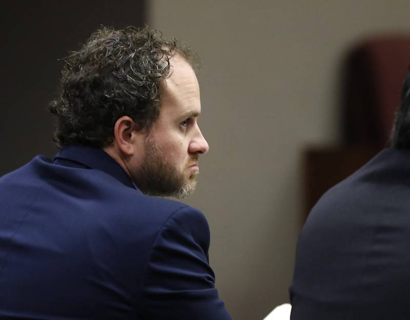 Nathan Rigg listens to testimony Tuesday, Aug. 30, 2022, during his jury trial before Judge Michael Coppedge in the McHenry County courthouse in Woodstock. Rigg was charged with two counts of predatory criminal sexual assault of a child younger than age 13, a Class X felony. Rigg was accused of sexually abusing a 4-year-old child in 2019, according to court records. The case was investigated by the Woodstock Police Department, and a warrant was issued for his arrest in March 2020.