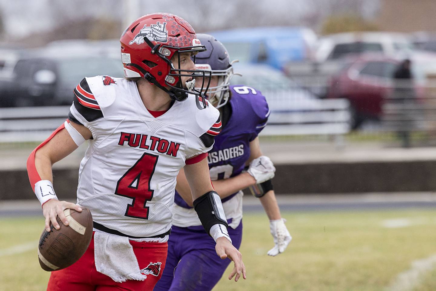 Fulton’s Brayden Dykstra looks for a receiver Saturday, Nov. 5, 2022 during a round two football playoff game against Rockford Lutheran.