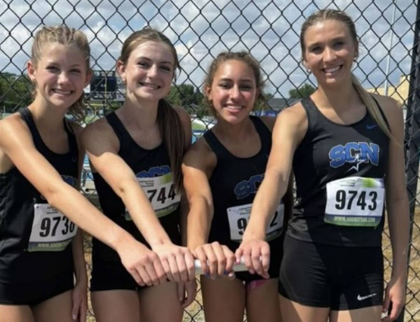 From left to right, St. Charles North's Gwen Hobson, Reese Thomas, Julia Rodney and Reagan Sipla