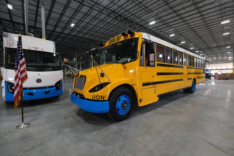 An all-electric school bus sits on display during a March 2022 news conference and interactive tour of the Lion Electric vehicle manufacturing facility in Joliet.